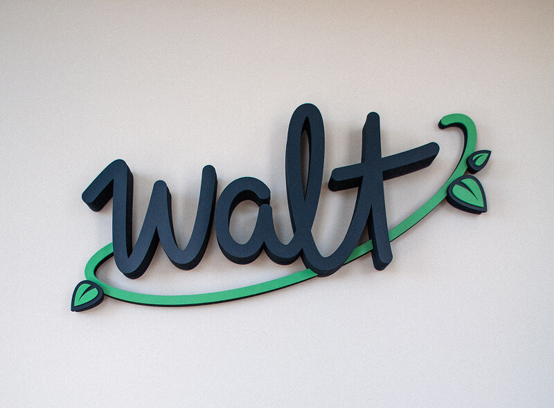 Logo Walt en décoration dans les bureaux de l'agence